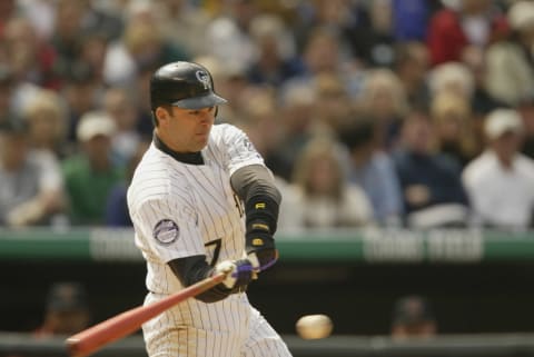 DENVER – APRIL 8: Todd Zeile #7 of the Colorado Rockies hits against the Houston Astros during the game at Coors Field in Denver, Colorado on April 8, 2002. The Rockies won 8-4. (Photo by Brian Bahr/Getty Images)