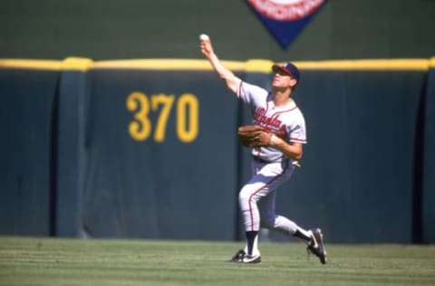 SAN DIEGO – 1987: Dale Murphy #3 of the Atlanta Braves throws the ball to the infield during a game against the San Diego Padres in 1987 at Jack Murphy Stadium in San Diego, California. (Photo by Stephen Dunn/Getty Images)