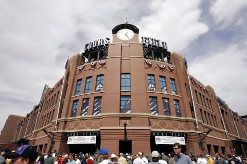 DENVER – APRIL 4: Fans pour into Coors Field for opening day for a game between the San Diego Padres and the Colorado Rockies on April 4, 2005 in Denver, Colorado. (Photo by Brian Bahr/Getty Images)