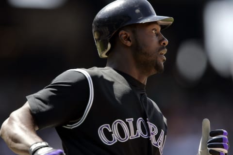 DENVER – MAY 15: Preston Wilson #44 of the Colorado Rockies watches his double land inside the wall in the sixth inning against the Arizona Diamondbacks on May 15, 2005 at Coors Field in Denver, Colorado. The D-backs defeated the Rockies 5-4. (Photo by Brian Bahr/Getty Images)