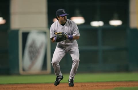 HOUSTON – OCTOBER 2: Infielder Vinny Castilla #9 of the Colorado Rockies throws the ball against the Houston Astros during the game on October 2, 2004 at Minute Maid Park in Houston, Texas. The Rockets won 9-3. (Photo by Ronald Martinez/Getty Images)