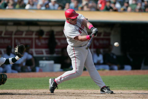 OAKLAND, CA – OCTOBER 3: Andres Galarraga #20 of the Anaheim Angels swings at an Oakland Athletics pitch during a MLB game at the Network Associates Coliseum on October 3, 2004 in Oakland, California. The Athletics won 3-2. (Photo by Jed Jacobsohn/Getty Images)