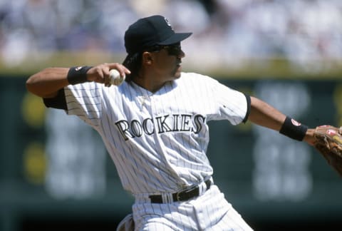 DENVER, CO – CIRCA 1996: Vinny Castilla #9 of the Colorado Rockies looks to make a throw to first base during aN Major League Baseball game circa 1995 at Coors Field in Denver, Colorado. Castilla played for the Rockies from 1993-99 and in 2004 and 2006. (Photo by Focus on Sport/Getty Images)