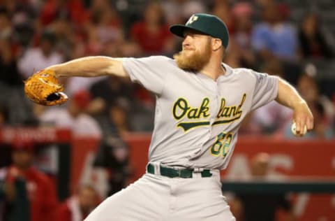 ANAHEIM, CA – JUNE 25: Sean Doolittle of the Oakland Athletics pitches during the ninth inning of a baseball game against the Los Angeles Angels of Anaheim at Angel Stadium of Anaheim on June 25, 2016 in Anaheim, California. (Photo by Sean M. Haffey/Getty Images)