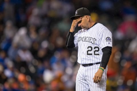 DENVER, CO – AUGUST 19: Walt Weiss #22 of the Colorado Rockies rubs his forehead after making a pitching change in the 10th inning of a game against the Chicago Cubs at Coors Field on August 19, 2016 in Denver, Colorado. (Photo by Dustin Bradford/Getty Images)