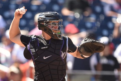 WASHINGTON, DC – AUGUST 27: Nick Hundley #4 of the Colorado Rockies throws to second base during a baseball game against the Washington Nationals at Nationals Park on August 27, 2016 in Washington, DC. The Rockies won 9-4 in 11 innings. (Photo by Mitchell Layton/Getty Images)