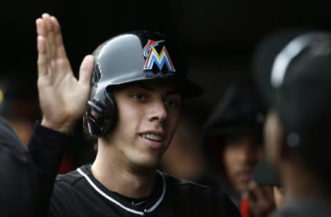 WASHINGTON, DC – OCTOBER 1: Christian Yelich of the Miami Marlins celebrates after scoring in the sixth inning against the Washington Nationals at Nationals Park on October 1, 2016 in Washington, DC. (Photo by Matt Hazlett/Getty Images)