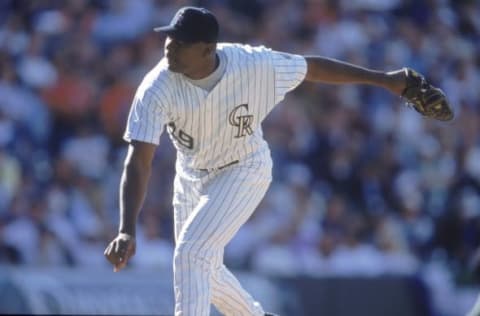 2 Apr 2001: Jose Jimenez #49 of the Colorado Rockies throws the pitch during the game against the St. Louis Cardinals at Coors Field in Denver, Colorado. The Rockies defeated the Cardinals 8-0. Mandatory Credit: Tom Hauck /Allsport