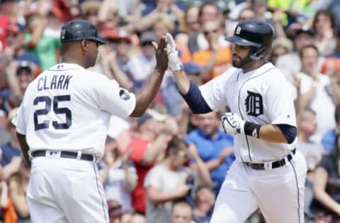 DETROIT, MI – JUNE 4: J.D. Martinez #28 of the Detroit Tigers is congratulated by third base coach Dave Clark #25 of the Detroit Tigers after hitting a solo home run against the Chicago White Sox during the fourth inning at Comerica Park on June 4, 2017 in Detroit, Michigan. (Photo by Duane Burleson/Getty Images)