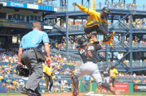 PITTSBURGH, PA – JUNE 11: Andrew McCutchen of the Pittsburgh Pirates is tagged out at home plate by J.T. Realmuto #11 of the Miami Marlins as part of a double play in the sixth inning during the game PNC Park on June 11, 2017 in Pittsburgh, Pennsylvania. (Photo by Justin Berl/Getty Images)