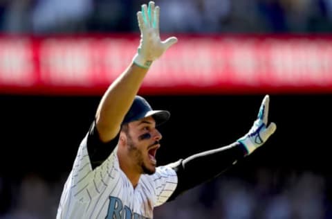 DENVER, CO – JUNE 18: Nolan Arenado #28 of the Colorado Rockies celebrates hitting a 3 RBI walk off home run in the ninth inning against the San Francisco Giants at Coors Field on June 18, 2017 in Denver, Colorado. (Photo by Matthew Stockman/Getty Images)