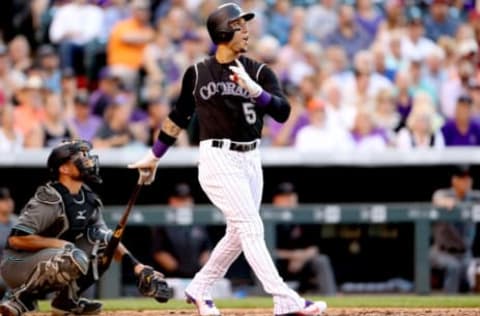 DENVER, CO – JUNE 20: Carlos Gonzalez #5 of the Colorado Rockies hits a solo home run in the fourth inning against the Arizona Diamondbacks at Coors Field on June 20, 2017 in Denver, Colorado. (Photo by Matthew Stockman/Getty Images)