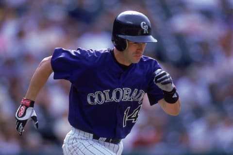 27 Jul 2000: Todd Walker #14 of the Colorado Rockies runs to first base during the game against the Los Angeles Dodgers at Coors Field in Denver, Colorado. The Dodgers defeated the Rockies 16-11.Mandatory Credit: Brian Bahr /Allsport