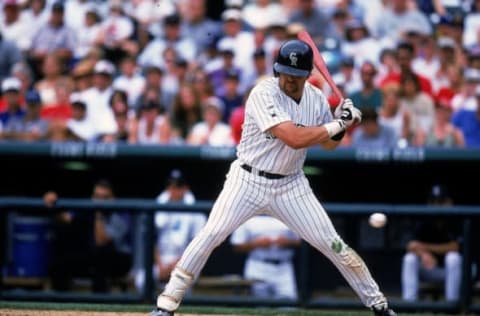 25 Jul 1999: Larry Walker #33 of the Colorado Rockies misses the ball as he stands at bat during the game against the St. Louis Cardinals at the Coors Field in Denver, Colorado. The Cardinals defeated the Rockies 10-6. Mandatory Credit: Brian Bahr /Allsport