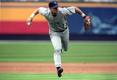 3 Apr 2000: Jeff Cirillo #7 of the Colorado Rockies stumbles as he throws the ball during the game against the Atlanta Braves at Turner Field in Atlanta, Georgia. The Braves defeated the Rockies 2-0.