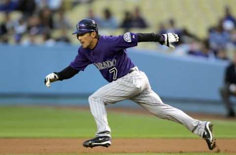 LOS ANGELES – APRIL 11: Kazuo Matsui #7 of the Colorado Rockies sprints to the base against the Los Angeles Dodgers on April 11, 2007 at Dodger Stadium in Los Angeles, California. (Photo by Stephen Dunn/Getty Images)