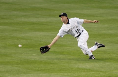 DENVER – MAY 10: Center fielder Steve Finley #12 of the Colorado Rockies dives to catch a fly ball by Ryan Klesko of the San Francisco Giants in the fourth inning on May 10, 2007 at Coors Field in Denver, Colorado. The Rockies won 5-3. (Photo by Brian Bahr/Getty Images)