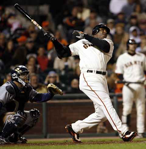 SAN FRANCISCO – AUGUST 24: Barry Bonds #25 of the San Francisco Giants hits his 761st home run off of Chris Capuano the Milwaukee Brewers during the fourth inning of a game August 24, 2007 at AT&T Park in San Francisco, California. (Photo by Dino Vournas/Getty Images)