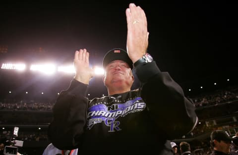 DENVER – OCTOBER 15: Manager Clint Hurdle #13 of the Colorado Rockies celebrates on the field after the Rockies 6-4 win against the Arizona Diamondbacks during Game Four of the National League Championship Series at Coors Field on October 15, 2007 in Denver, Colorado. The Rockies defeated the Diamondbacks 6-4 to sweep the series 4-0. (Photo by Doug Pensinger/Getty Images)