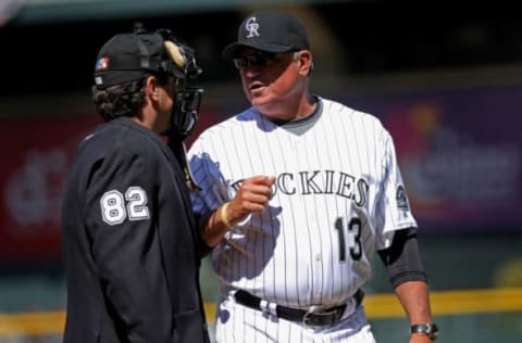 DENVER – APRIL 04: Manager Clint Hurdle #13 of the Colorado Rockies protests a call with home plate umpire Rob Drake #82 in the first inning against the Arizona Diamondbacks on opening day at Coors Field on April 4, 2008 in Denver, Colorado. (Photo by Doug Pensinger/Getty Images)