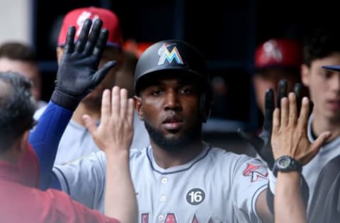 MILWAUKEE, WI – JULY 01: Marcell Ozuna of the Miami Marlins celebrates with teammates after scoring a run in the third inning against the Milwaukee Brewers at Miller Park on July 1, 2017 in Milwaukee, Wisconsin. (Photo by Dylan Buell/Getty Images)