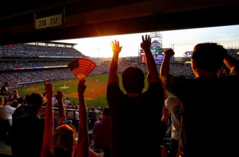 DENVER, CO – JULY 4: Fans participate in the wave during the sixth inning of a game between the Cincinnati Reds and Colorado Rockies at Coors Field on July 4, 2017 in Denver, Colorado. The Reds defeated the Rockies 8-1. (Photo by Justin Edmonds/Getty Images)