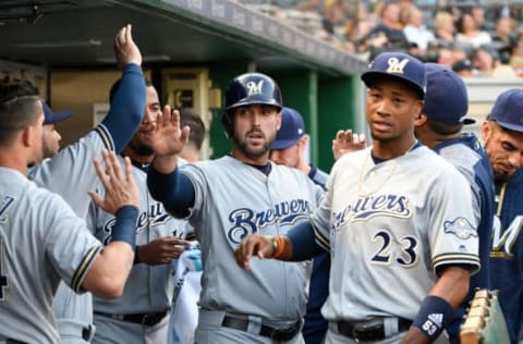 PITTSBURGH, PA – JULY 17: Travis Shaw #21 of the Milwaukee Brewers celebrates with teammates in the dugout after coming around to score on an RBI single by Orlando Arcia #3 in the second inning during the game against the Pittsburgh Pirates at PNC Park on July 17, 2017 in Pittsburgh, Pennsylvania. (Photo by Justin Berl/Getty Images)