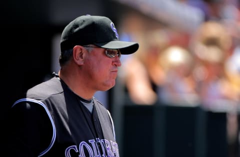 DENVER – MAY 14: Manager Clint Hurdle #13 of the Colorado Rockies looks on from the dugout against the Houston Astros during MLB action at Coors Field on May 14, 2009 in Denver, Colorado. The Astros defeated the Rockies 5-3. (Photo by Doug Pensinger/Getty Images)