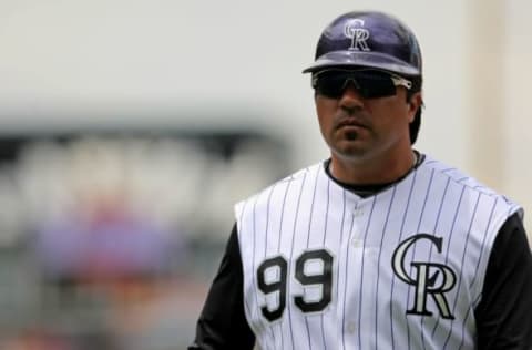 DENVER – MAY 31: Vinny Castilla #99 of the Colorado Rockies coaches first base against the San Diego Padres during MLB action at Coors Field on May 31, 2009 in Denver, Colorado. The Padres defeated the Rockies 5-2. (Photo by Doug Pensinger/Getty Images)