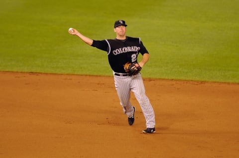 WASHINGTON – AUGUST 18: Garrett Atkins #27 of the Colorado Rockies fields a ground ball during a baseball game against the Washington Nationals on August 18, 2009 at Nationals Park in Washington, D.C. (Photo by Mitchell Layton/Getty Images)