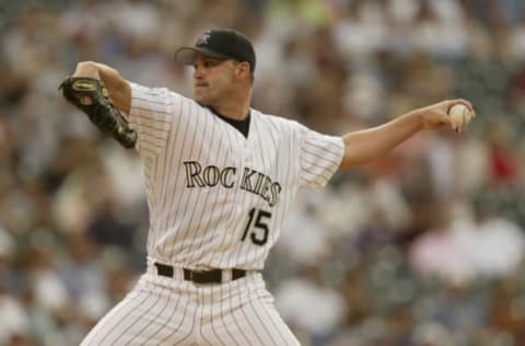 DENVER – JULY 2: Pitcher Denny Neagle #15 of the Colorado Rockies throws a pitch during the MLB game against the San Francisco Giants on July 2, 2002 at Coors Field in Denver, Colorado. The Giants defeated the Rockies 18-5. (Photo by Brian Bahr/Getty Images)