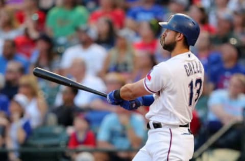 ARLINGTON, TX – MAY 05: Joey Gallo #13 of the Texas Rangers watches the ball on a solo home run in the second inning of a baseball game agaisnt the Boston Red Sox at Globe Life Park in Arlington on May 5, 2018 in Arlington, Texas. (Photo by Richard Rodriguez/Getty Images)