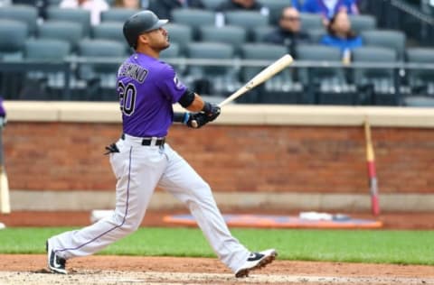 NEW YORK, NY – MAY 06: Ian Desmond #20 of the Colorado Rockies connects on a solo home run in the first inning against the New York Mets at Citi Field on May 6, 2018 in the Flushing neighborhood of the Queens borough of New York City. (Photo by Mike Stobe/Getty Images)