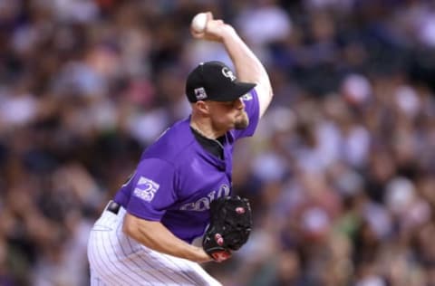 DENVER, CO – MAY 10: Pitcher Mike Dunn #38 of the Colorado Rockies throws in the fifth inning against the Milwaukee Brewers at Coors Field on May 10, 2018 in Denver, Colorado. (Photo by Matthew Stockman/Getty Images)