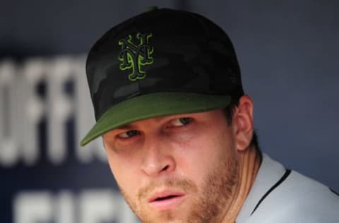 ATLANTA, GA. – MAY 28: Jacob deGrom #48 of the New York Mets relaxes in the dugout after the second inning against the Atlanta Braves during game one of a doubleheader at SunTrust Field on May 28, 2018 in Atlanta, Georgia. MLB players across the league are wearing special uniforms to commemorate Memorial Day. (Photo by Scott Cunningham/Getty Images)