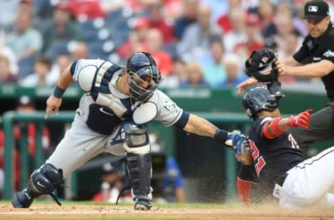 WASHINGTON, DC – JUNE 05: Juan Soto #22 of the Washington Nationals slides by Wilson Ramos #40 of the Tampa Bay Rays to score in the second inning on a Wilmer Difo #2 fielders choice during a baseball game against the Tampa Bay Rays at Nationals Park on June 5, 2018 in Washington, DC. (Photo by Mitchell Layton/Getty Images)