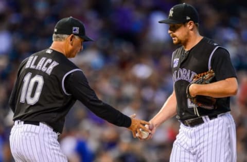 DENVER, CO – JUNE 9: Bud Black #10 of the Colorado Rockies relieves Bryan Shaw #29 after Shaw gave up 6 runs (1 earned) in the eighth inning of a game against the Arizona Diamondbacks at Coors Field on June 9, 2018 in Denver, Colorado. (Photo by Dustin Bradford/Getty Images)