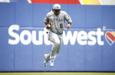 ARLINGTON, TX – JUNE 17: Gerardo Parra #8 of the Colorado Rockies catches a fly ball off the bat of Nomar Mazara of the Texas Ranger to end the first inning at Globe Life Park in Arlington on June 17, 2018 in Arlington, Texas. (Photo by Ron Jenkins/Getty Images)