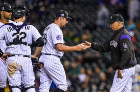 DENVER, CO – JUNE 19: Bud Black #10 of the Colorado Rockies relieves Bryan Shaw #29 after Shaw loaded the bases with one out in the seventh inning of a game at Coors Field on June 19, 2018 in Denver, Colorado. (Photo by Dustin Bradford/Getty Images)