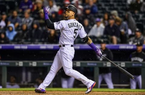 DENVER, CO – JUNE 19: Carlos Gonzalez #5 of the Colorado Rockies hits a fourth inning solo homerun against the New York Mets at Coors Field on June 19, 2018 in Denver, Colorado. (Photo by Dustin Bradford/Getty Images)