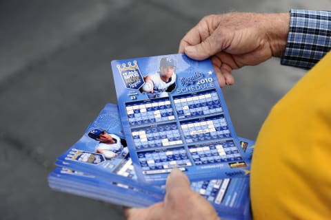 KANSAS CITY, MO – APRIL 05: Season schedule magnets of the Kansas City Royals are handed out prior to the 2010 home opener against the Detroit Tigers on April 5, 2010 at Kauffman Stadium in Kansas City, Missouri. (Photo by G. Newman Lowrance/Getty Images)