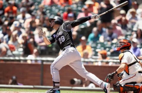 SAN FRANCISCO, CA – JUNE 28: Nolan Arenado #28 of the Colorado Rockies hits a home run in the first inning against the San Francisco Giants at AT&T Park on June 28, 2018 in San Francisco, California. (Photo by Ezra Shaw/Getty Images)