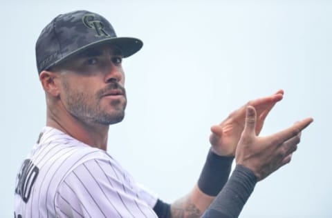 DENVER, CO – JULY 15: Ian Desmond #20 of the Colorado Rockies claps as members of the armed forces are recognized on Military Appreciation Day during a game against the Seattle Mariners at Coors Field on July 15, 2018 in Denver, Colorado. (Photo by Dustin Bradford/Getty Images)