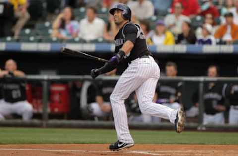 DENVER, CO – JULY 14: Ryan Spilborghs #19 of the Colorado Rockies heads toward first as he watches his solo homerun off of starting pitcher Yovani Gallardo #49 of the Milwaukee Brewers in the first inning at Coors Field on July 14, 2011 in Denver, Colorado. (Photo by Doug Pensinger/Getty Images)