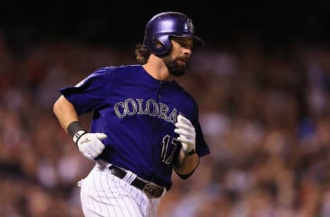 DENVER, CO – SEPTEMBER 24: Todd Helton #17 of the Colorado Rockies runs to first as he singles against the Boston Red Sox in the sixth inning at Coors Field on September 24, 2013 in Denver, Colorado. (Photo by Doug Pensinger/Getty Images)