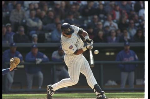 14 Apr 1997: First baseman Andres Galarraga of the Colorado Rockies swings at a pitch during the Rockies 10-8 win over the Montreal Expos at Coors Field in Denver, Colorado. Credit: Getty Images.