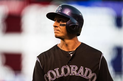 DENVER, CO – JULY 25: Troy Tulowitzki #2 of the Colorado Rockies reacts after flying out in the seventh inning of a game against the Cincinnati Reds at Coors Field on July 25, 2015 in Denver, Colorado. (Photo by Dustin Bradford/Getty Images)