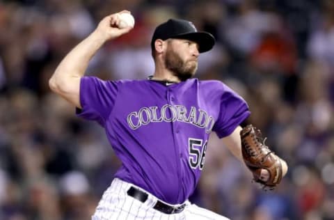 DENVER, CO – JULY 18: Greg Holland #56 of the Colorado Rockies throws in the ninth inning against the San Diego Padres at Coors Field on July 18, 2017 in Denver, Colorado. (Photo by Matthew Stockman/Getty Images)