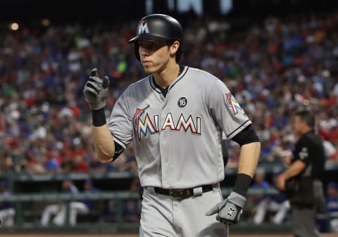 ARLINGTON, TX – JULY 25: Christian Yelich #21 of the Miami Marlins celebrates a three-run homerun against the Texas Rangers in the fifth inning at Globe Life Park in Arlington on July 25, 2017 in Arlington, Texas. (Photo by Ronald Martinez/Getty Images).