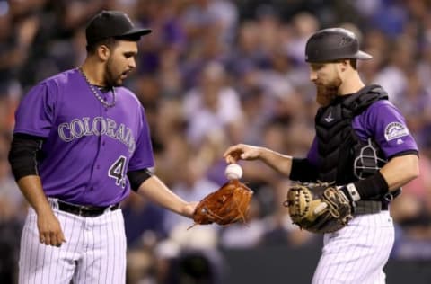 DENVER, CO – AUGUST 04: Pitcher Antonio Senzatela #49 and cacther Jonathan Lucroy #21 of the Colorado Rockies meet at the mound in the sixth inning against the Philadelphia Phillies at Coors Field on August 4, 2017 in Denver, Colorado. (Photo by Matthew Stockman/Getty Images)